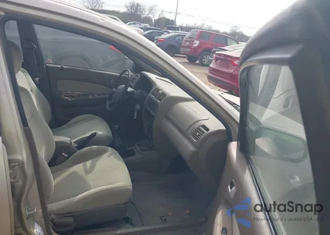 1997 Mazda Protege Dx/Lx z USA, uszkodzony, nr VIN JM1BC1413V0151138